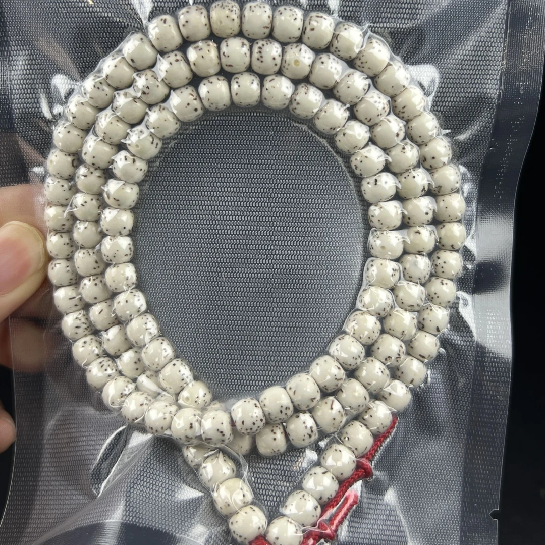 星月菩提大留白河豚7x6顺白原生态海南料108颗脖挂手串