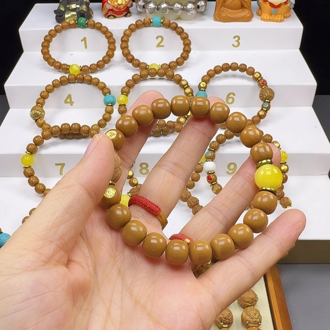 枫***：猴头核桃吊坠猴头手串