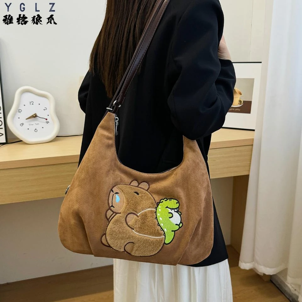 雅格狼爪可爱少女托特包2025秋冬新款百搭通勤双肩包卡通时尚单肩
