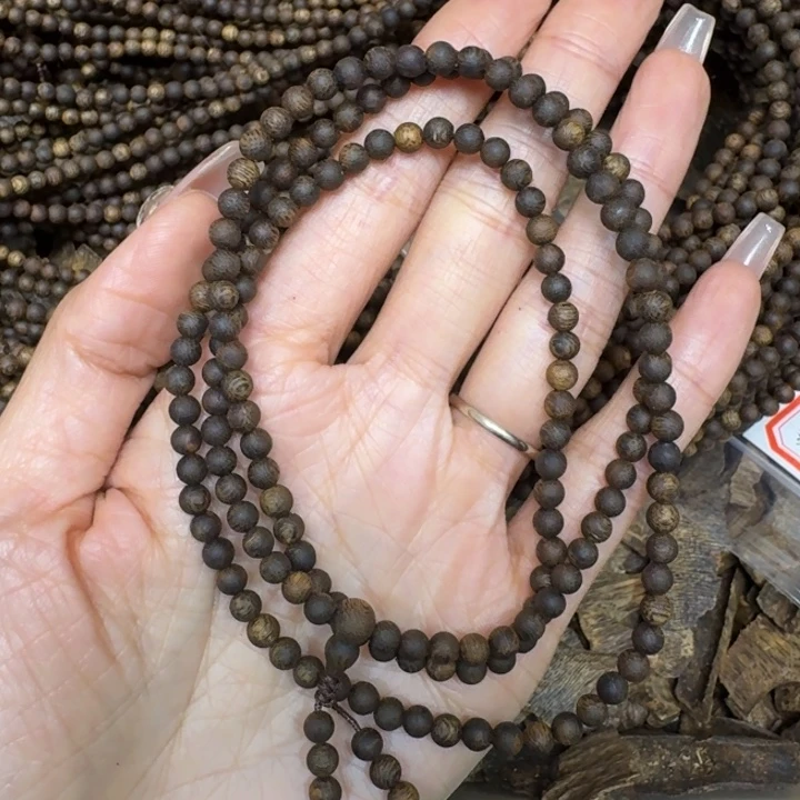 沉香手串张勺子沉浮一条