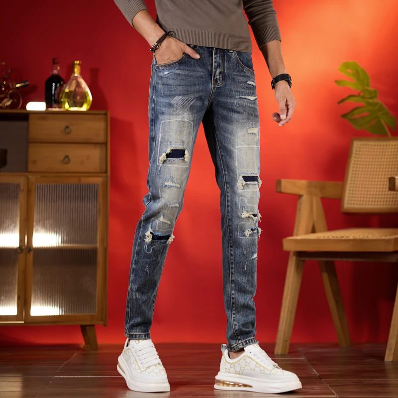 秋季新款男士牛仔裤蓝色泼墨假破洞修身小脚长裤弹力休闲可选九分