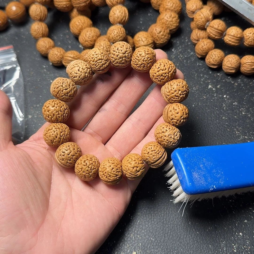 萝***酥吊坠桃核野生手串