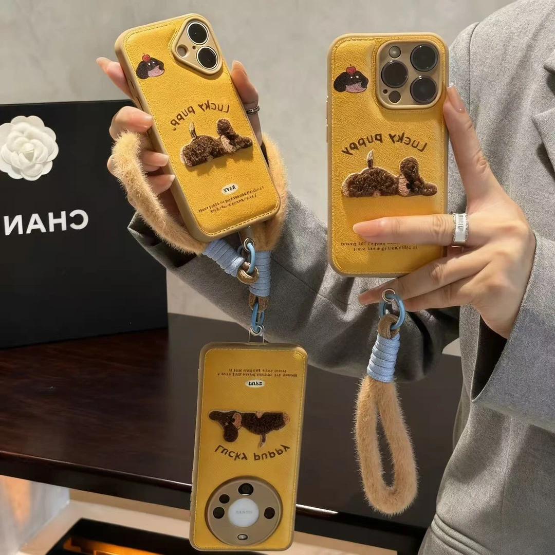 适用刺绣小狗挂绳苹果17/16promax气垫手机壳华为oppo小米15vivo