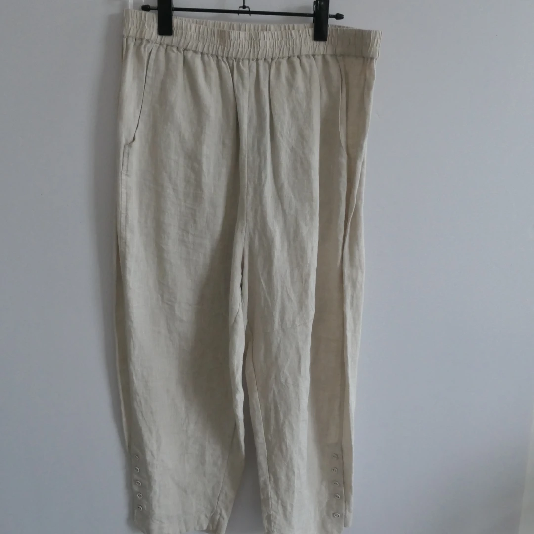 XQ-2309亚麻十扣萝卜裤