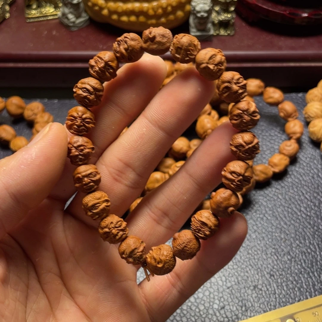 龙纹桃核雕刻向死而生