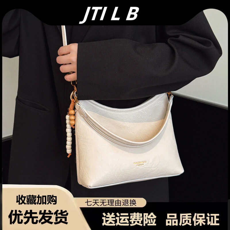 法式复古流行腋下水桶包2025秋冬新款时尚百搭小众软皮单肩斜挎包