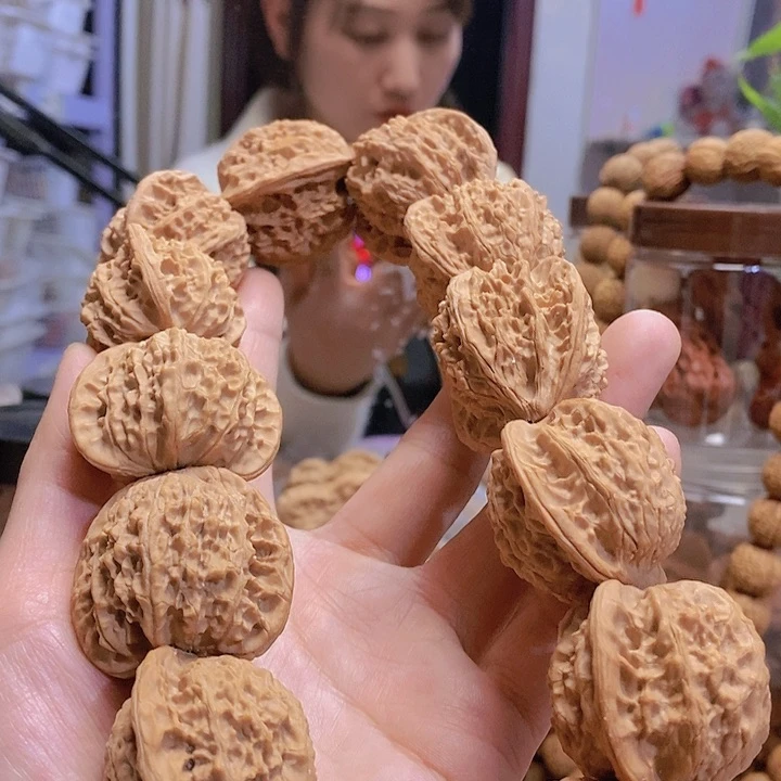 【闪购商品】文玩核桃把件凤眼手持