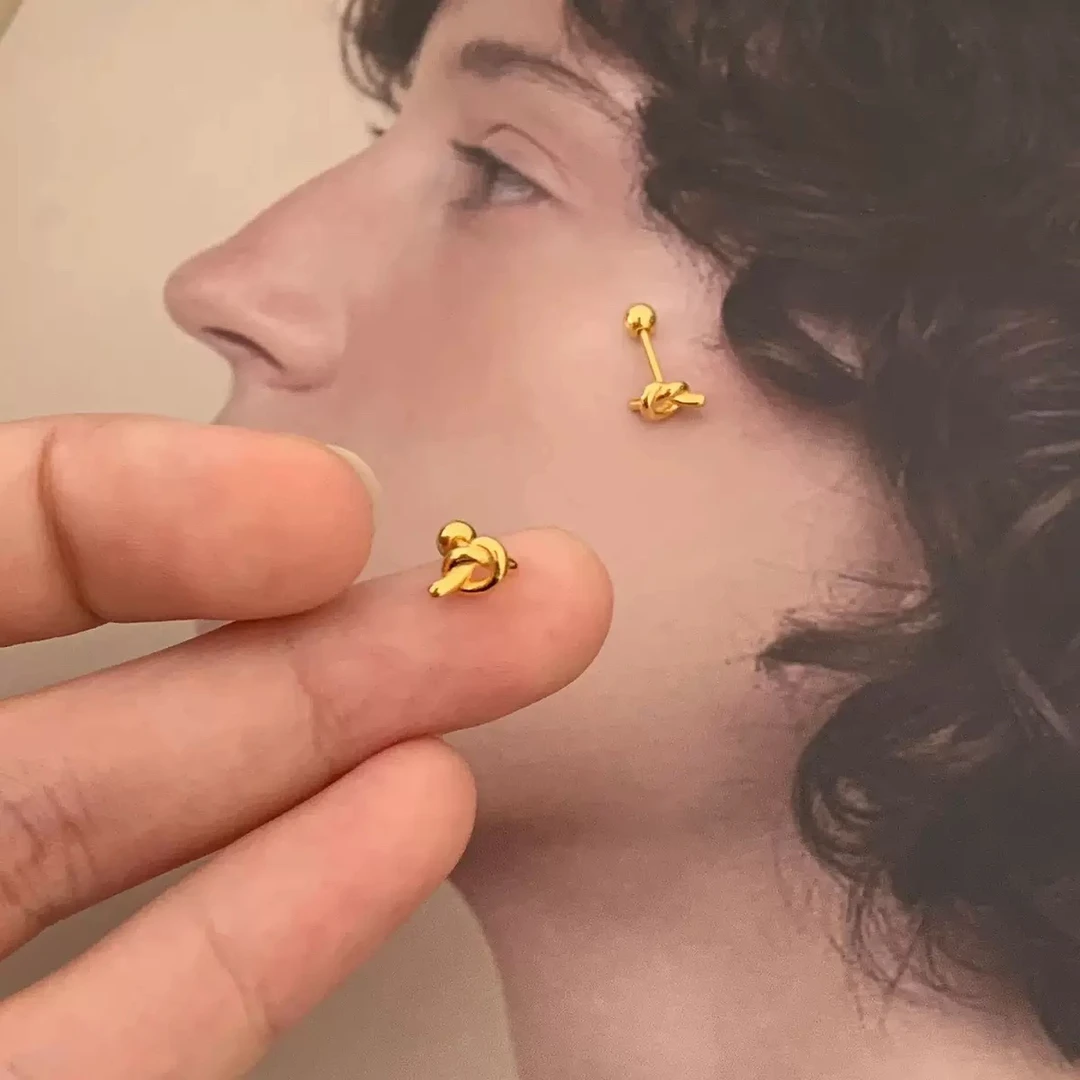 足银耳饰 999银打结耳钉简约小众设计女款时尚百搭