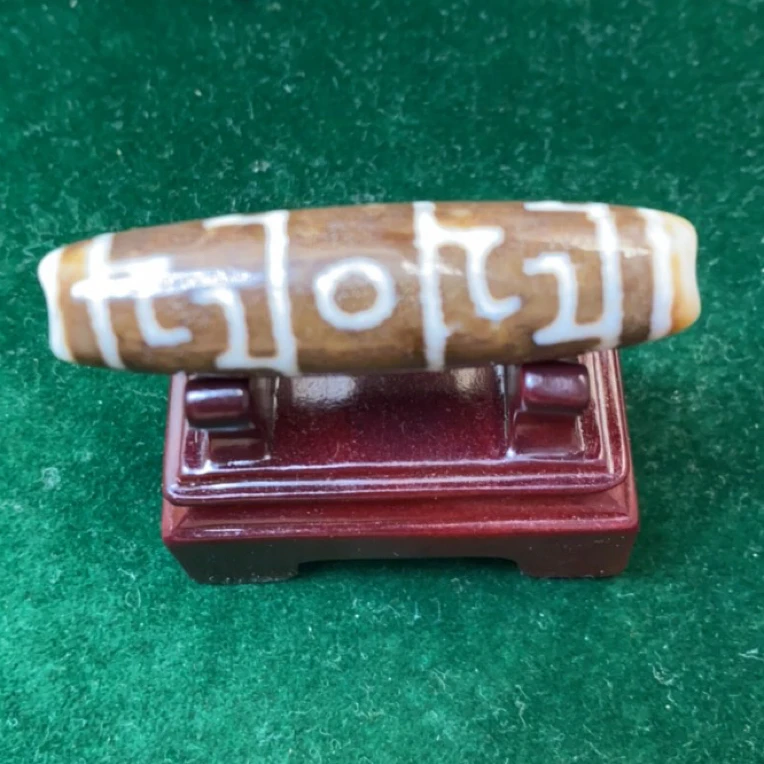 咖色白线莲师三眼