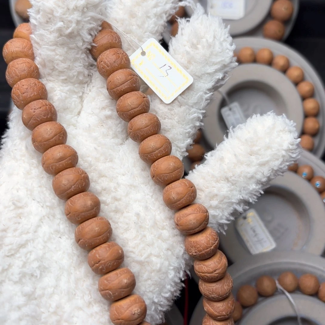 凤眼菩提吊坠切片手持13