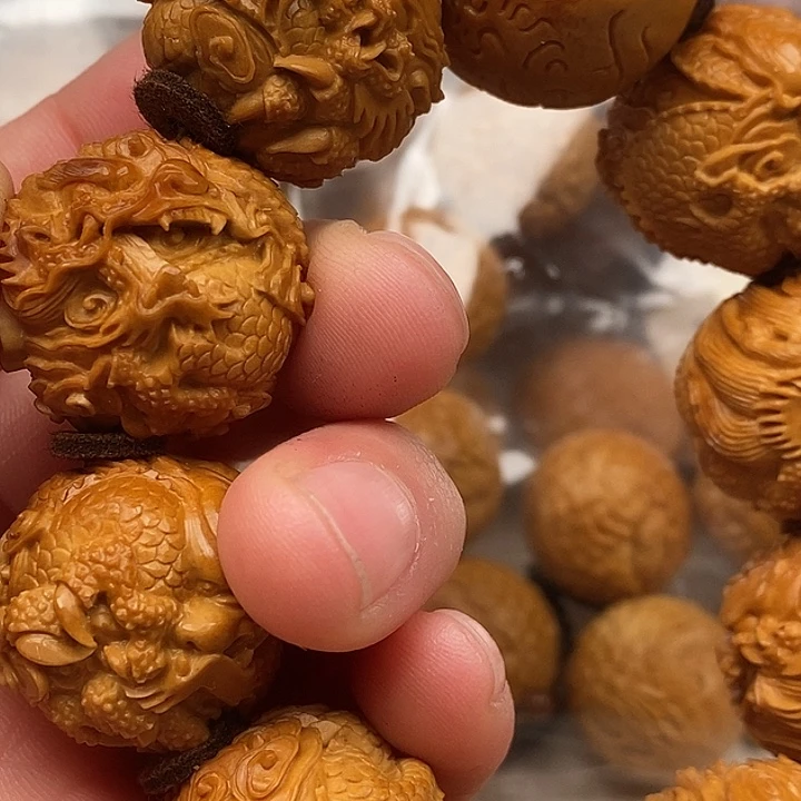 动***车橄榄核吊坠橄榄核