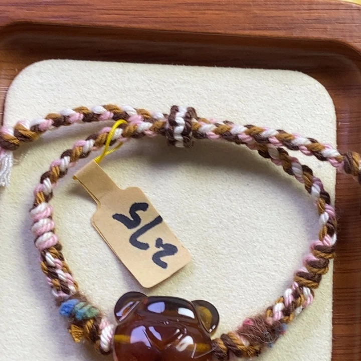 橄榄核吊坠熊头手串