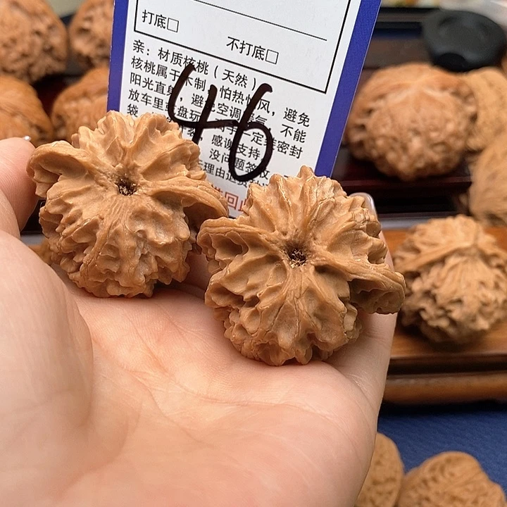 赵***伟桃核吊坠苹果园狮子头42