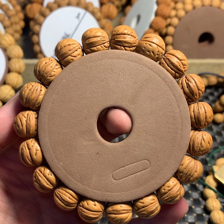 手串桃核1#东北野生红皮奶豆