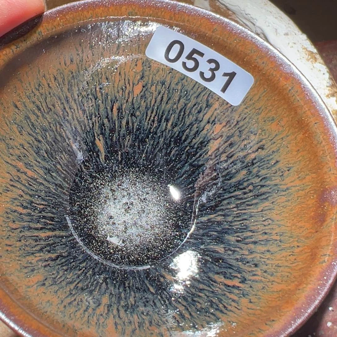 茶盏花***歌在你面前装你没良心