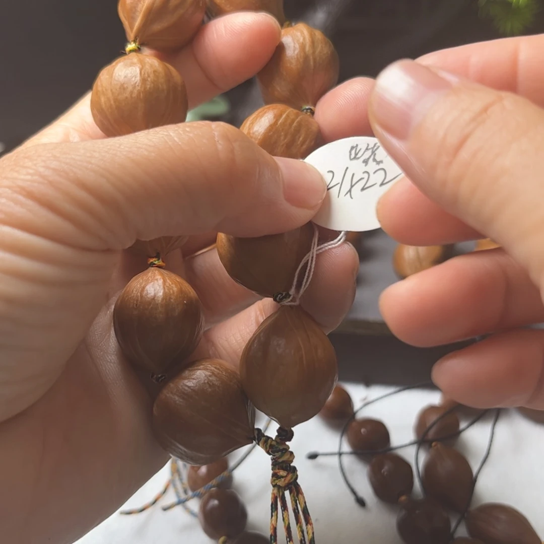 啊***鹏橄榄核手串/手链2.1*2.2四花原皮精品树王铁核