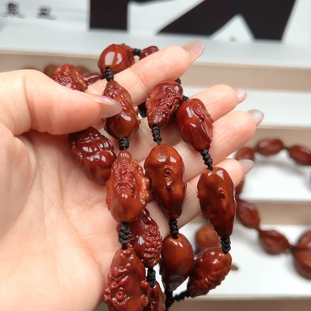 王***梁橄榄核手串十八罗汉