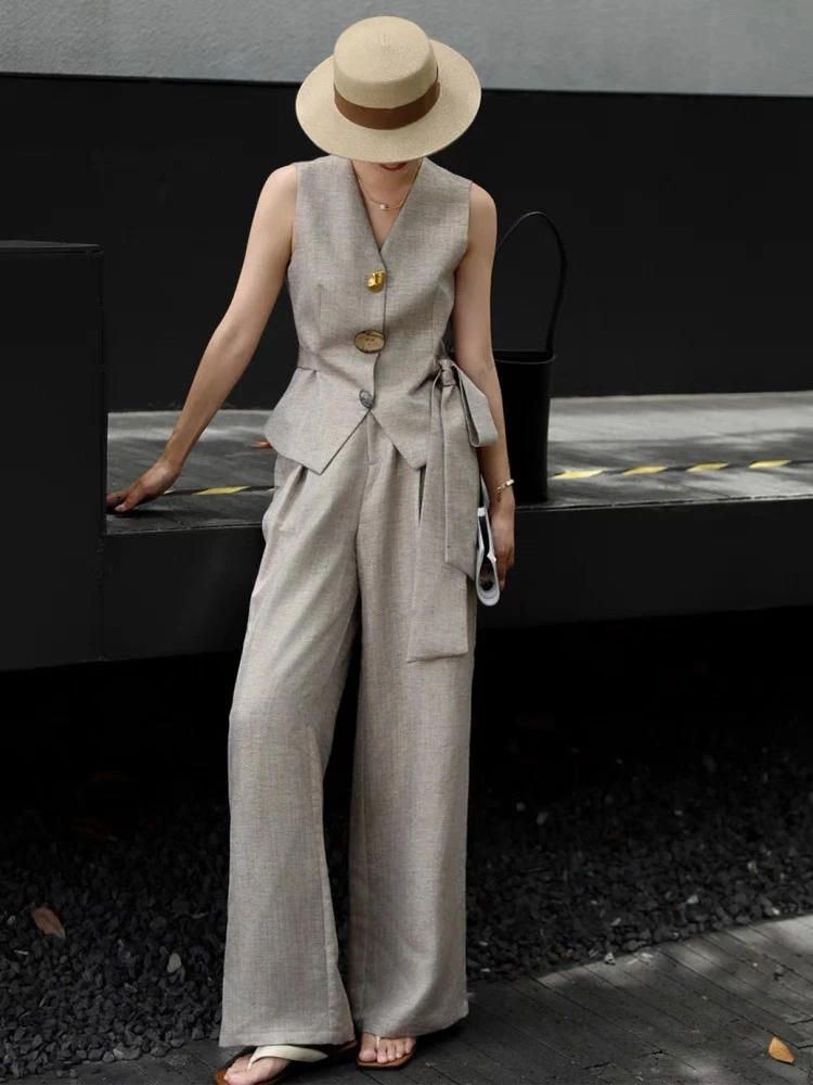 女人味单排扣减龄马甲+时尚直筒显瘦长裤套装C4205P4569