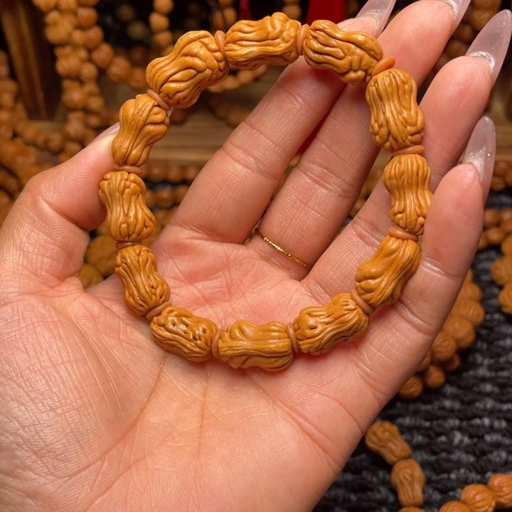 墨***咪木质类龙纹桃枭手串