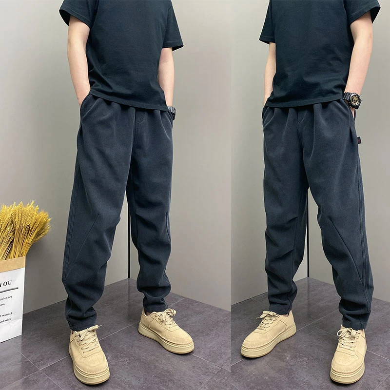 2025秋冬新款爆款休闲裤网红时尚拼接韩版小脚裤简约黑色户外长裤