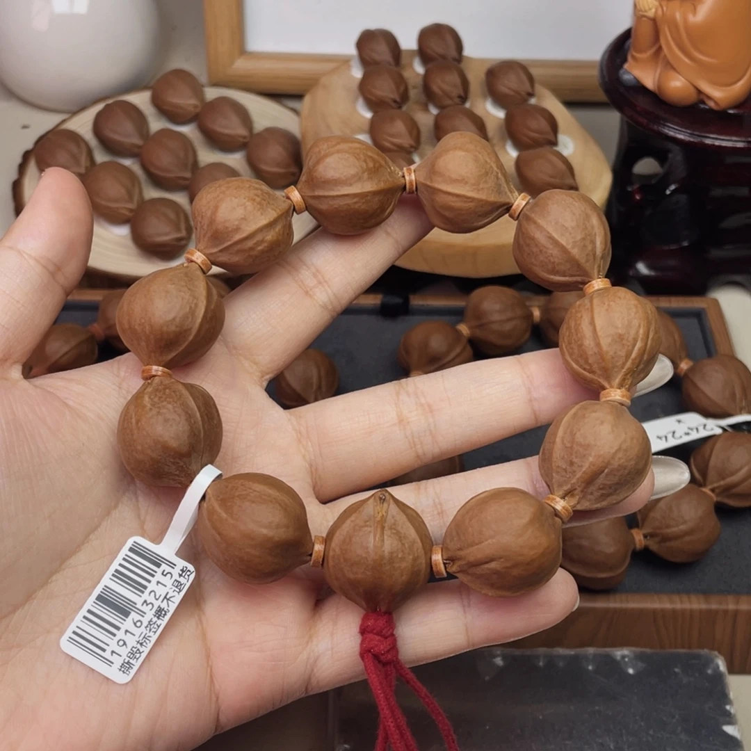 老***童手串/手链橄榄核21.524梅林铁核