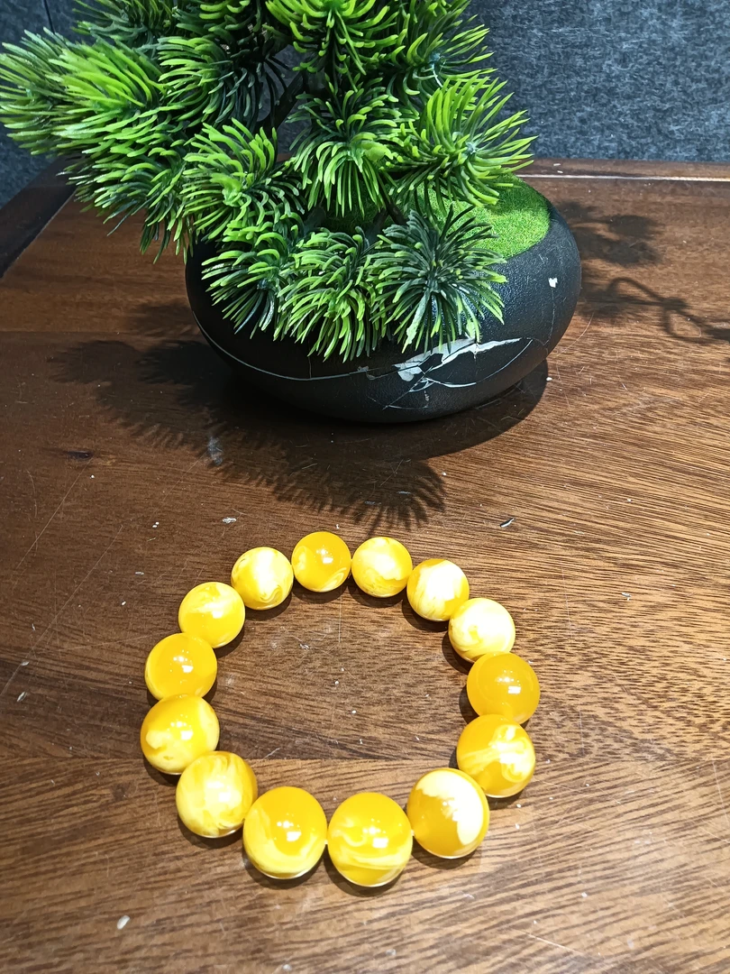鸡油黄白花圆珠手串