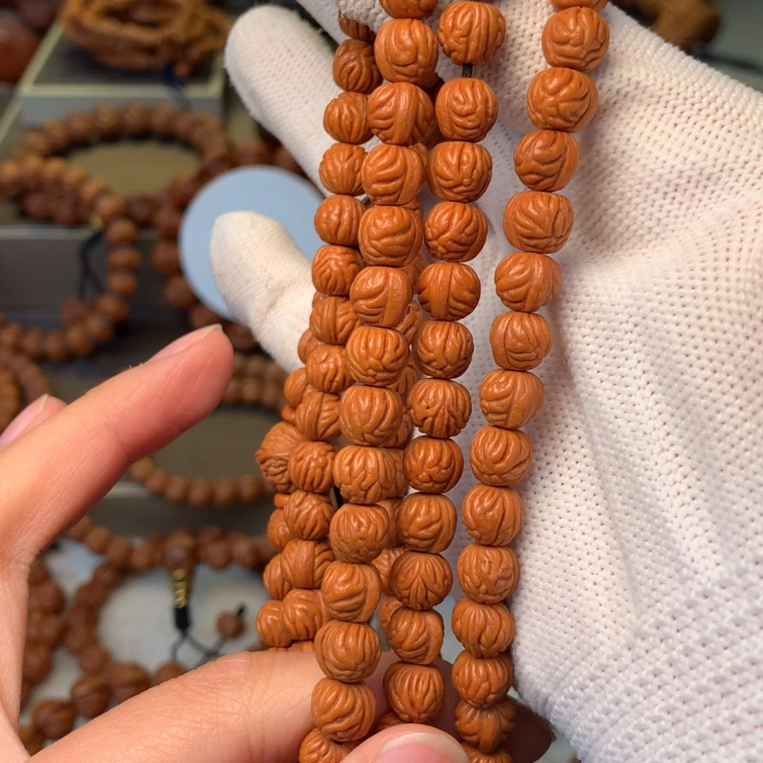 羽***海桃核手串秦岭龙纹