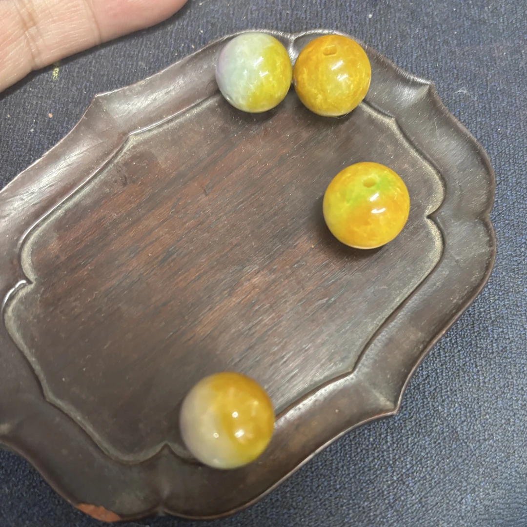 圆珠种老水头足无纹裂翡翠