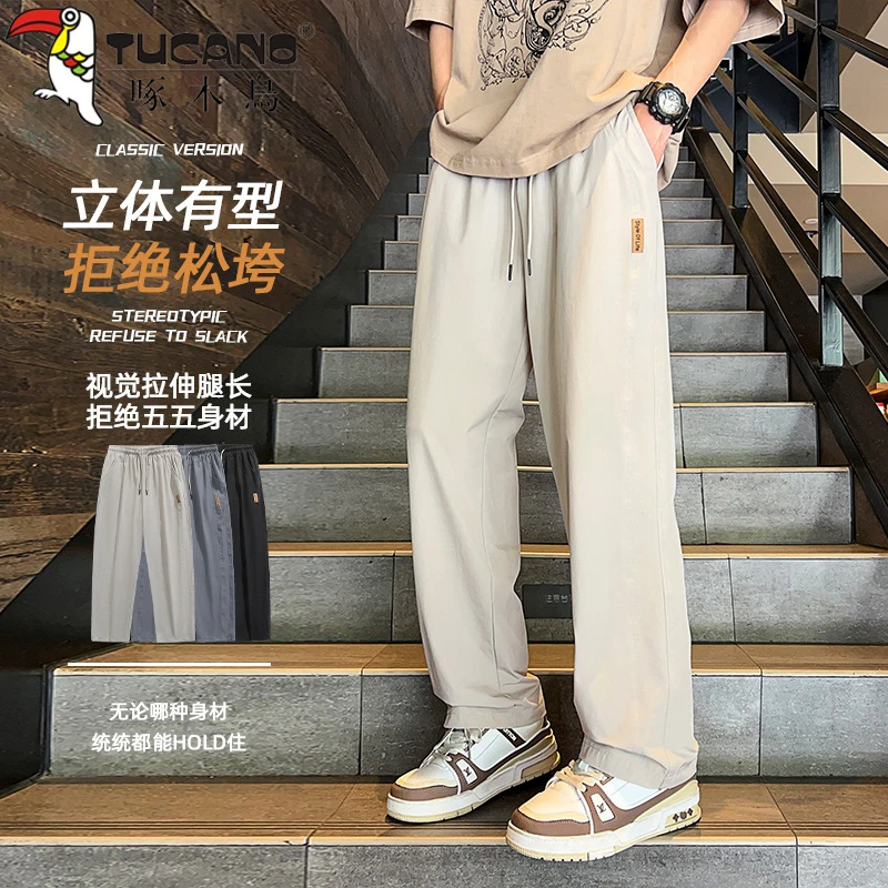 啄木鸟夏季休闲新款冰丝休闲裤宽松男士薄款潮流运动宽松直筒长裤