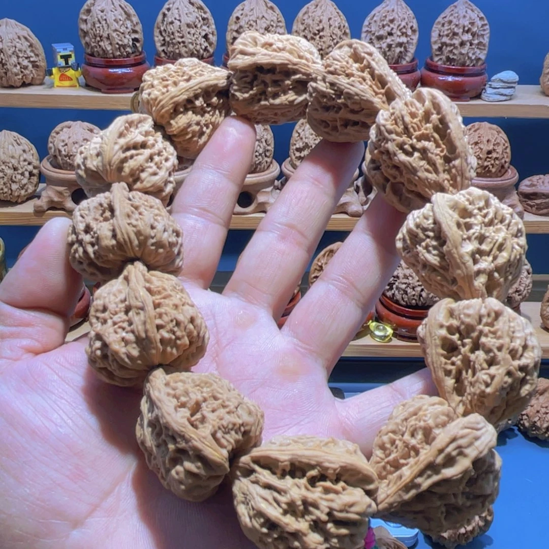 钱***子文玩核桃吊坠南疆石手持