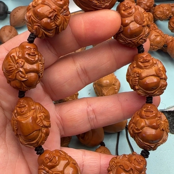橄榄核手串丢****儿橄榄核雕工艺手串