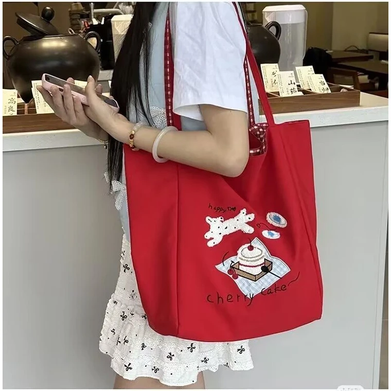 女包包包腋下包托特包2025新款韩版帆布印花包手提包潮