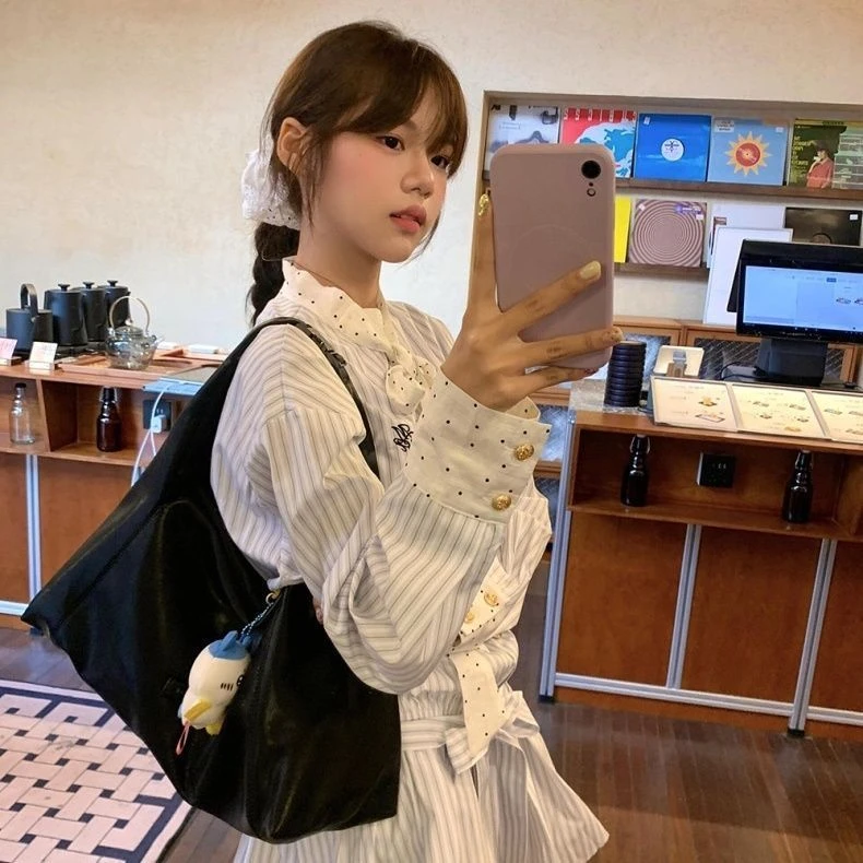 蝴蝶结条纹刺绣长袖连衣裙女2025春季新款设计感收腰显瘦A字短裙