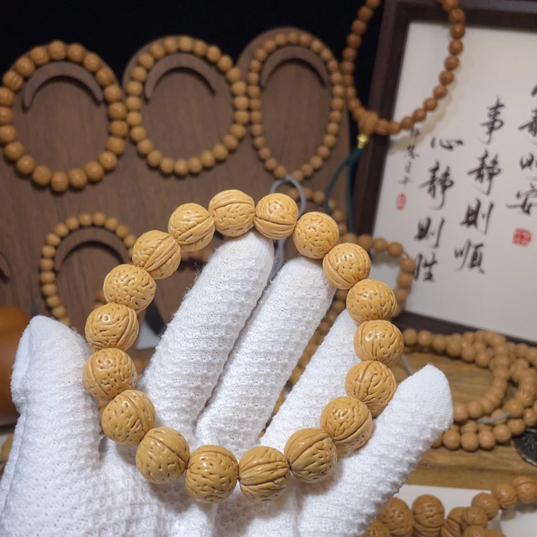 _***9吊坠桃核野生盘锦