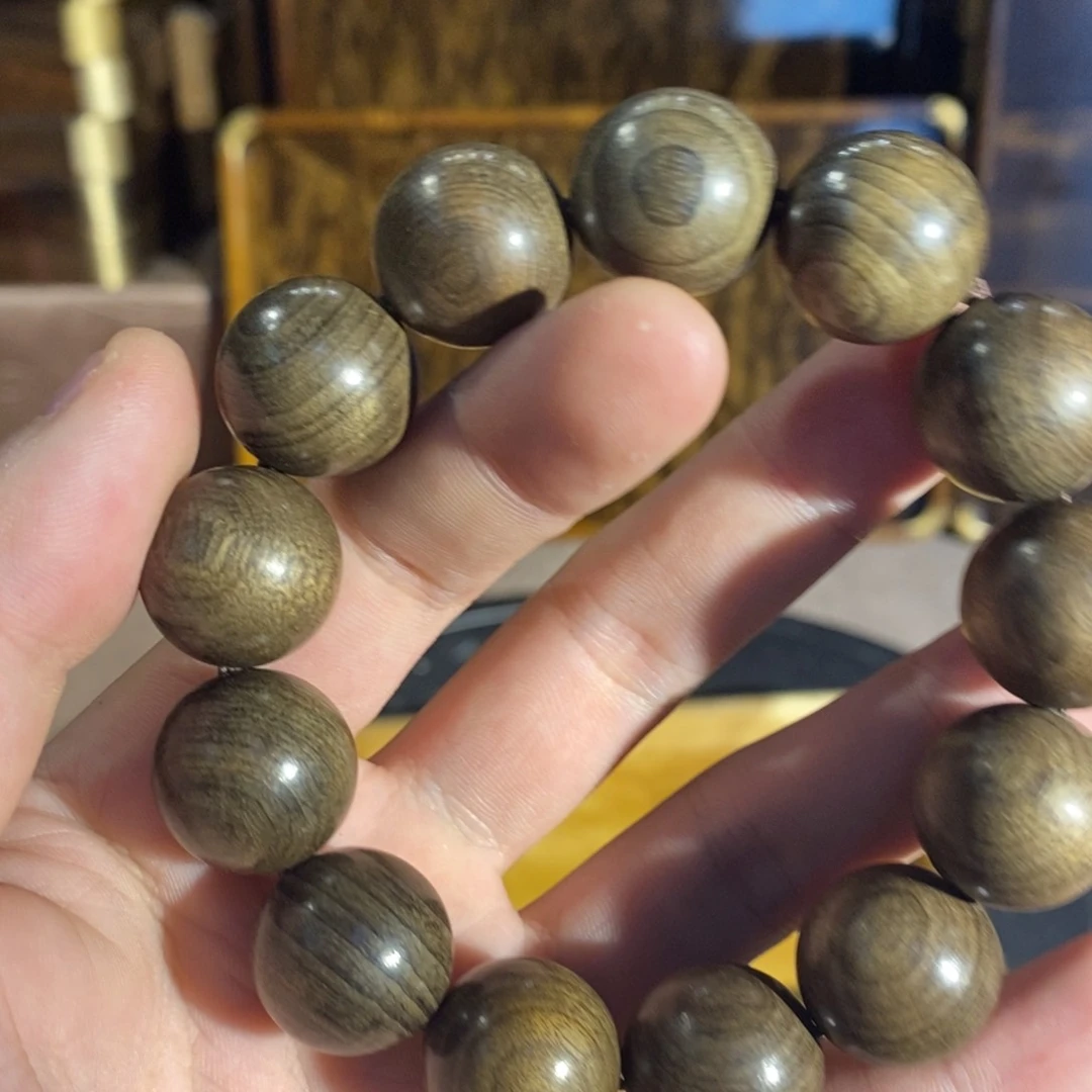 金丝楠1.8乌木手串里面丝楠木