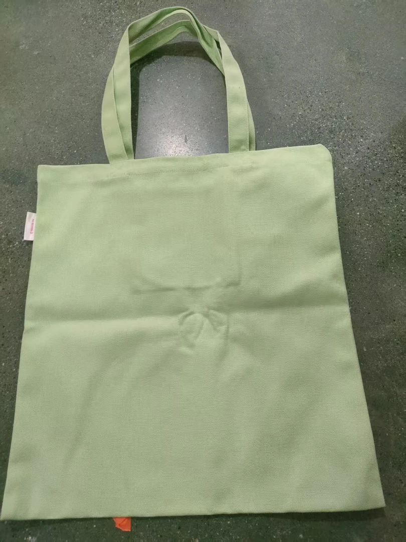 浅绿色帆布手提收纳包包发2