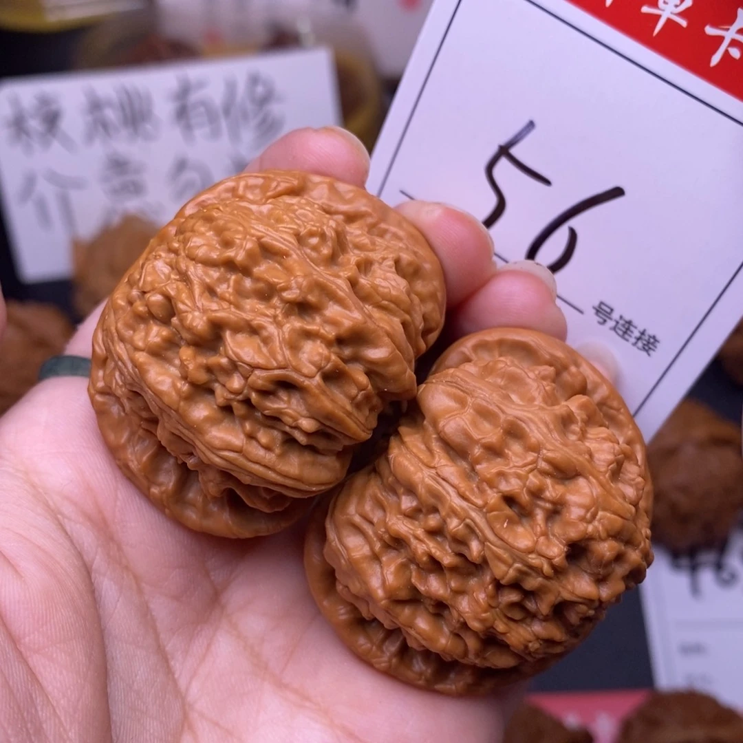 文玩核桃把件56闷尖白狮子头4.4