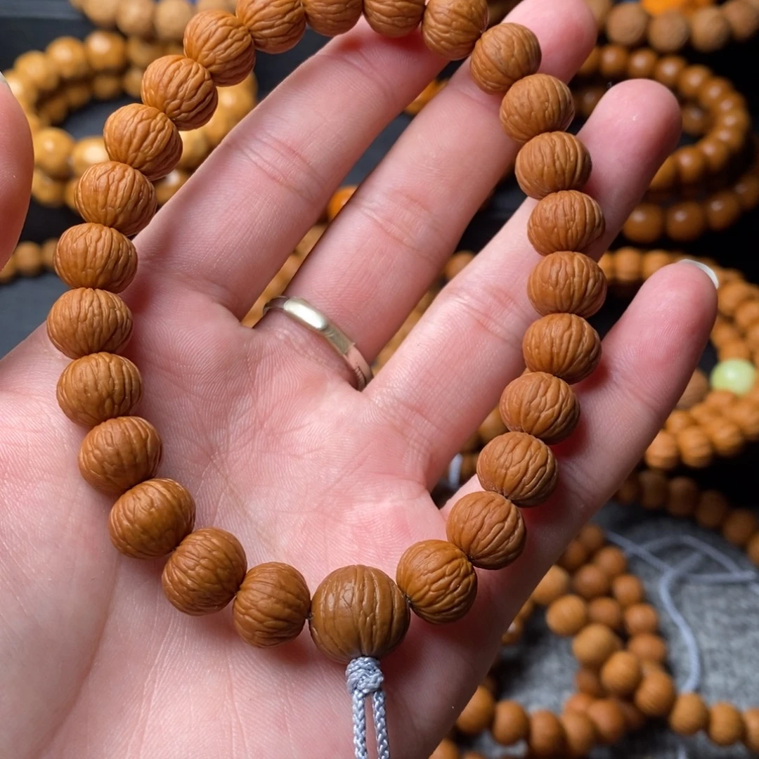 吱***朱猴头核桃手串1111111