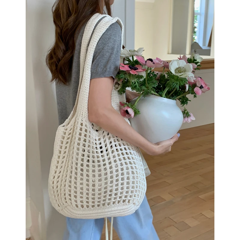 2025年升级加厚耐磨针织镂空水桶包沙滩编织包大容量托特包单肩包
