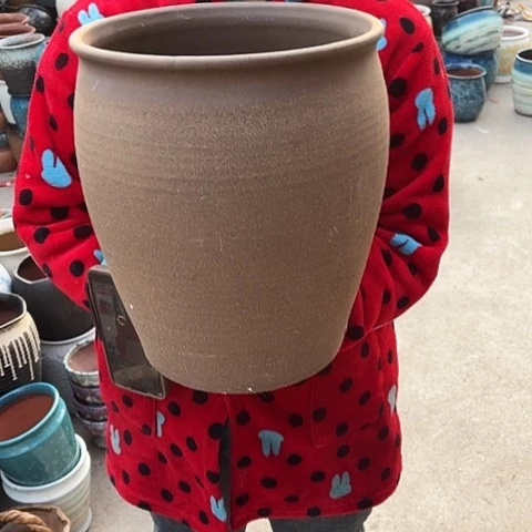 口25高30瑕疵口裂盆子。