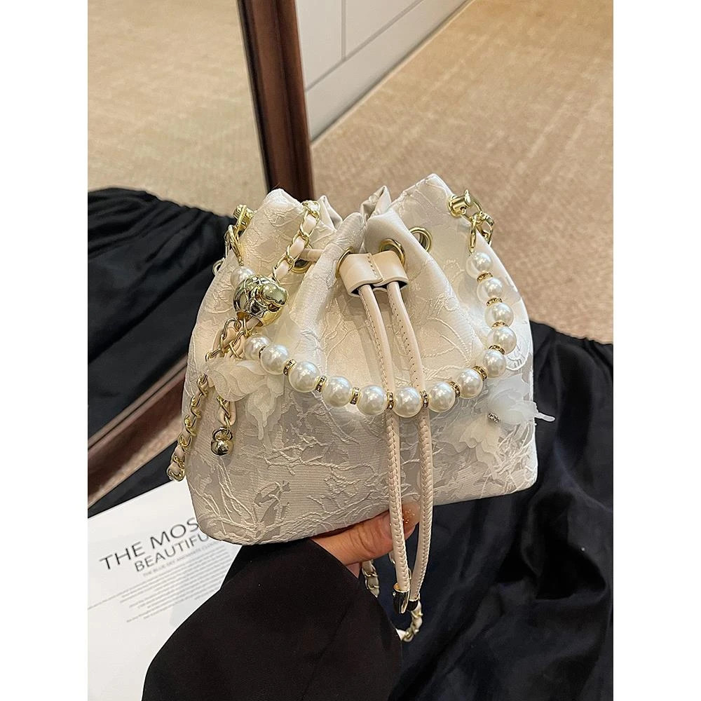 新中式国风串珠手提小包女2025新款洋气百搭单肩包通勤斜挎水桶包