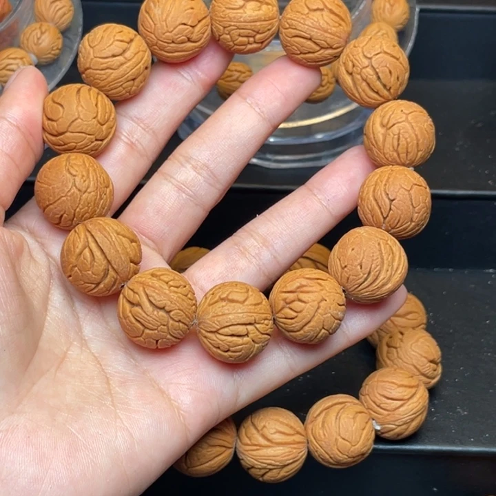 桃核手串金丝龙珠18