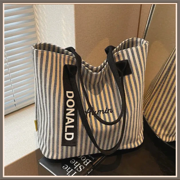 条纹大容量帆布包包女2025新款BJXP时尚手提单肩购物袋休闲【多宠】