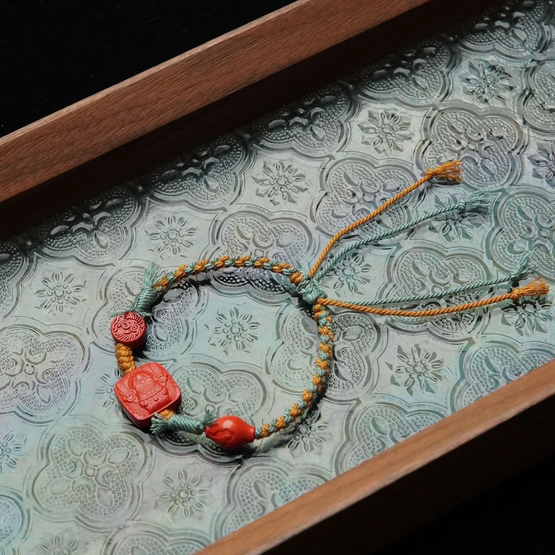 含辰砂工艺品朱砂雕刻扎基牌14*6mm手编绳单圈手串