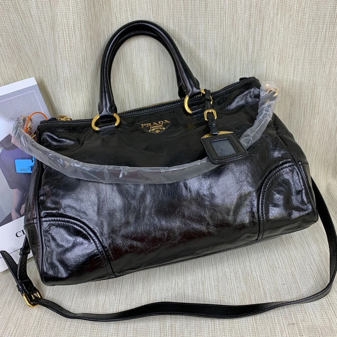 95新 Prada/普拉达 黑金油蜡机车包/MS09122319/2319/护