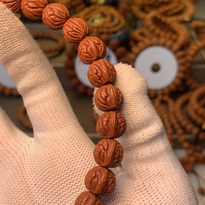 陈***迅桃核手串补差价的