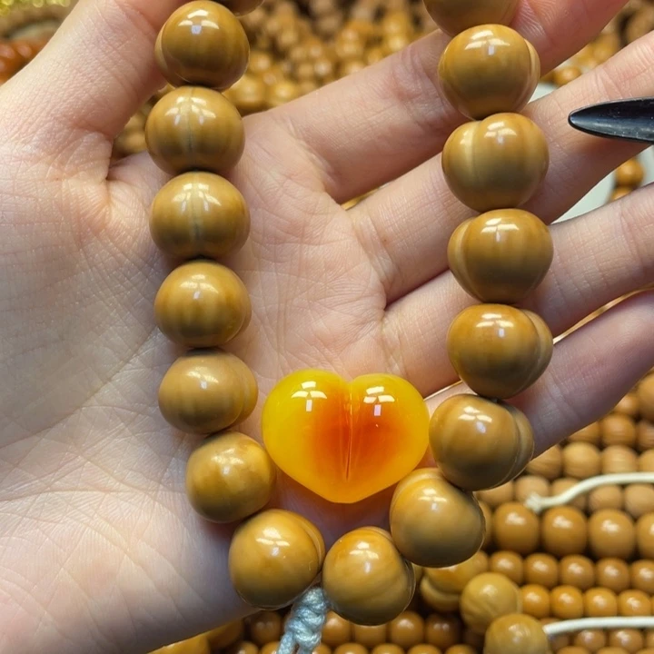 C***佳猴头核桃手串二等屁桃加爱心