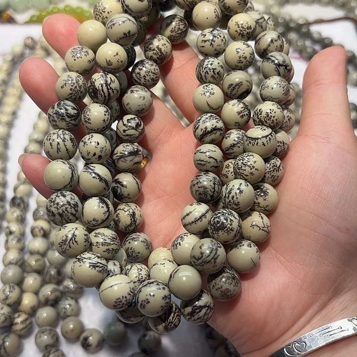 李***）蛇纹石玉未镶嵌手串