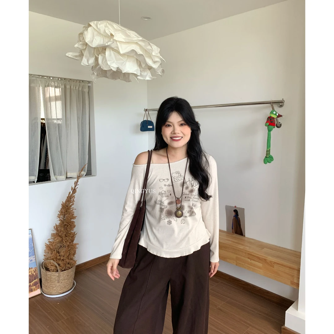 青屿衫-秋季Kitty猫收腰微胖显瘦露肩大码女装设计感上衣初恋系