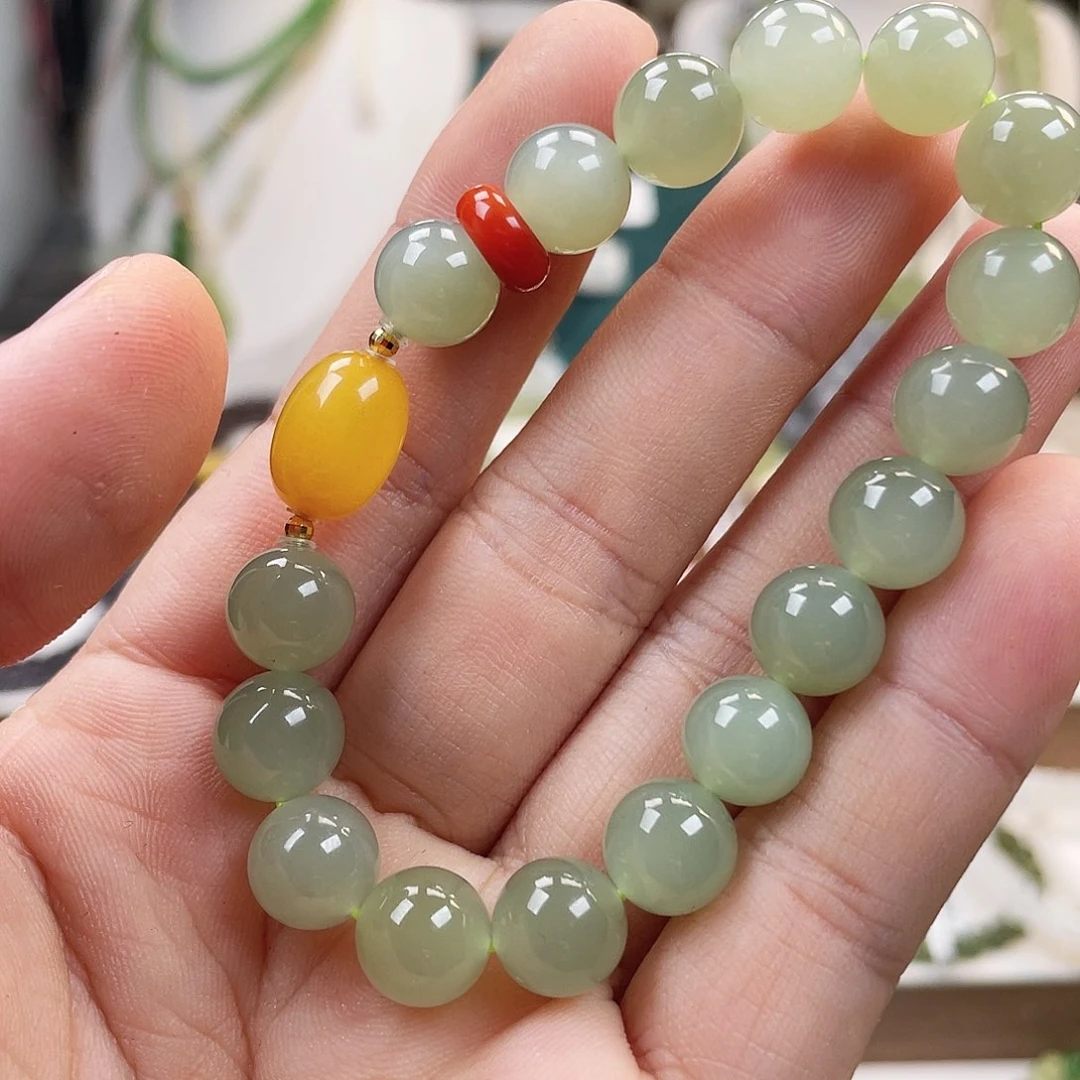 18K金镶嵌手链和田玉笑***姐10